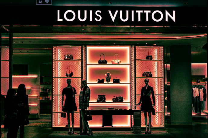 Louis vuitton store with mannequins and handbags